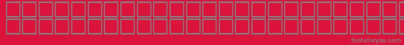 AlBattar-fontti – harmaat kirjasimet punaisella taustalla