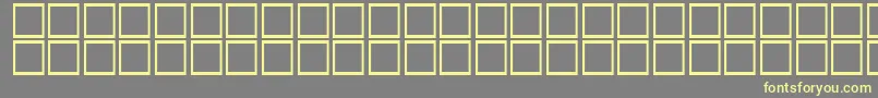 AlBattar Font – Yellow Fonts on Gray Background