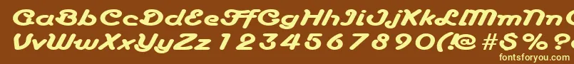 AnacondaexpandedRegular-fontti – keltaiset fontit ruskealla taustalla