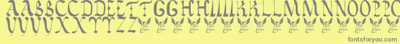 VaticanRoughLetters8thC. Font – Gray Fonts on Yellow Background