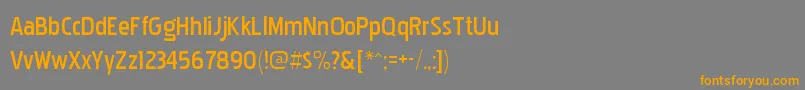フォントPakenhambk – オレンジの文字は灰色の背景にあります。