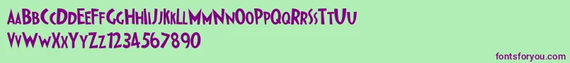 IpkissZf-Schriftart – Violette Schriften auf grünem Hintergrund
