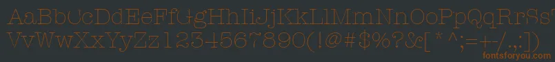 Czcionka ItcAmericanTypewriterLtLight – brązowe czcionki na czarnym tle