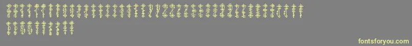 fuente VulcanScript – Fuentes Amarillas Sobre Fondo Gris