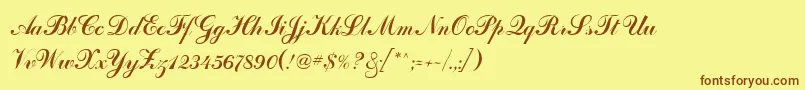 フォントOdessaScriptCyr – 茶色の文字が黄色の背景にあります。