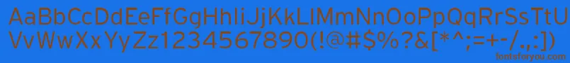 フォントPftransitLight – 茶色の文字が青い背景にあります。