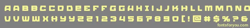 フォントOlympiccarriertitle – 黄色のフォント、灰色の背景