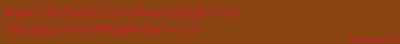 Mckenna Font – Red Fonts on Brown Background