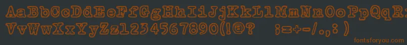 TammikuunKolmas-fontti – ruskeat fontit mustalla taustalla