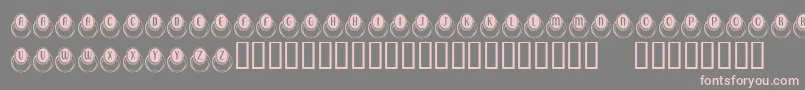 フォントKrMoodRing – 灰色の背景にピンクのフォント