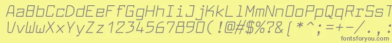 フォントLarabiefontrgItalic – 黄色の背景に灰色の文字
