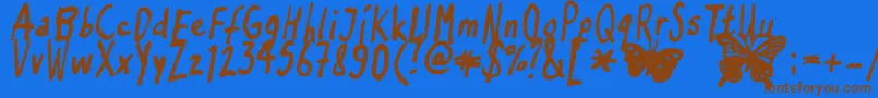 Inkyflutterby Font – Brown Fonts on Blue Background