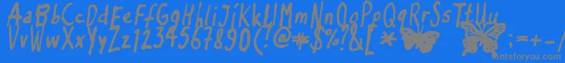Inkyflutterby Font – Gray Fonts on Blue Background