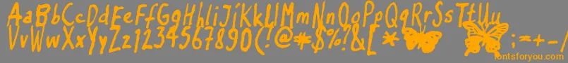 Inkyflutterby Font – Orange Fonts on Gray Background