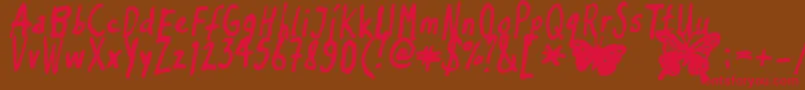 Inkyflutterby Font – Red Fonts on Brown Background