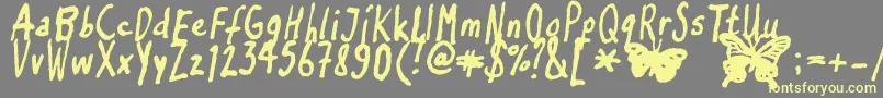 Inkyflutterby Font – Yellow Fonts on Gray Background