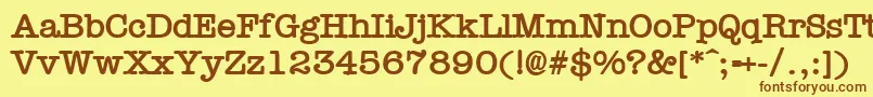 フォントTypewrB – 茶色の文字が黄色の背景にあります。