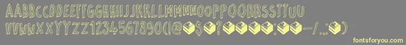 DkPetitFour Font – Yellow Fonts on Gray Background