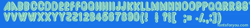 Dazzler ffy Font – Green Fonts on Blue Background