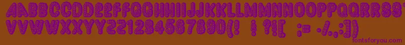 Dazzler ffy Font – Purple Fonts on Brown Background