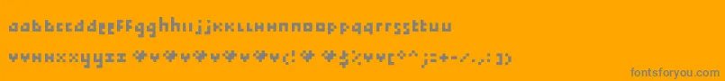 Tokayz Font – Gray Fonts on Orange Background