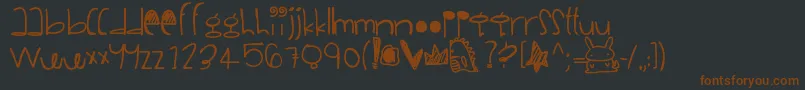 Шрифт Vanillarainbows – коричневые шрифты на чёрном фоне