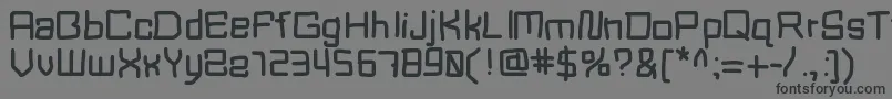 Mbblocktype-Schriftart – Schwarze Schriften auf grauem Hintergrund