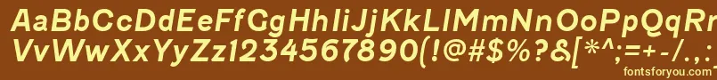 FenwickrgBolditalic-fontti – keltaiset fontit ruskealla taustalla
