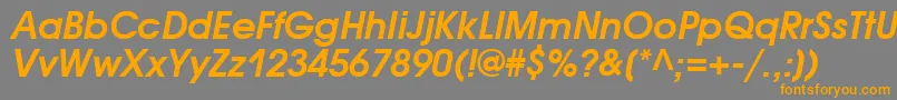 フォントAvantgardecttBolditalic – オレンジの文字は灰色の背景にあります。