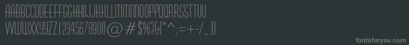 フォントAHuxley – 黒い背景に灰色の文字