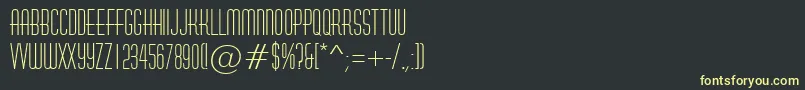 フォントAHuxley – 黒い背景に黄色の文字