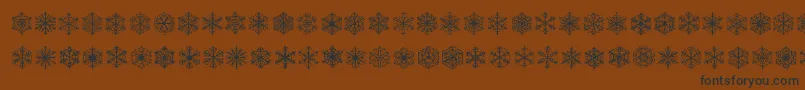 Шрифт Fauxsnow – чёрные шрифты на коричневом фоне