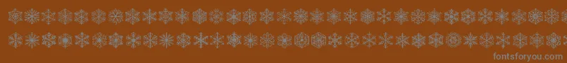 Fauxsnow Font – Gray Fonts on Brown Background