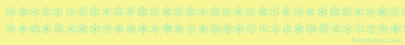 Fauxsnow-Schriftart – Grüne Schriften auf gelbem Hintergrund