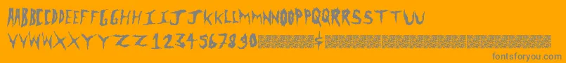 Czcionka Metalclash – szare czcionki na pomarańczowym tle