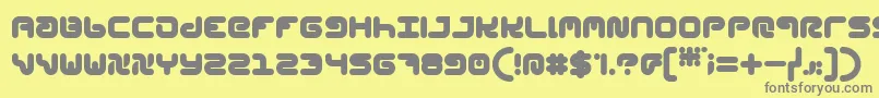 StylPlain-fontti – harmaat kirjasimet keltaisella taustalla