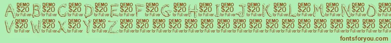 SmeltedDemo Font – Brown Fonts on Green Background