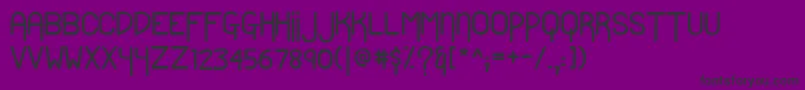 Lubgrotto Font – Black Fonts on Purple Background