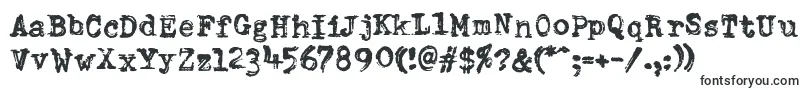 Шрифт DumboldtypewriterDoublepunch – разрушенные шрифты
