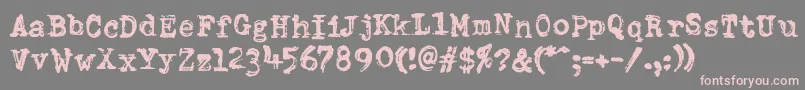 Czcionka DumboldtypewriterDoublepunch – różowe czcionki na szarym tle