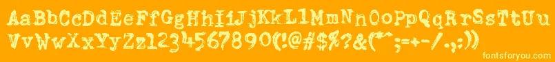 Шрифт DumboldtypewriterDoublepunch – жёлтые шрифты на оранжевом фоне