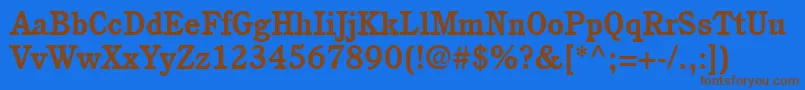 フォントItcCushingLtBold – 茶色の文字が青い背景にあります。