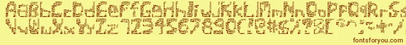 フォントShatteredsiliconwafers – 茶色の文字が黄色の背景にあります。
