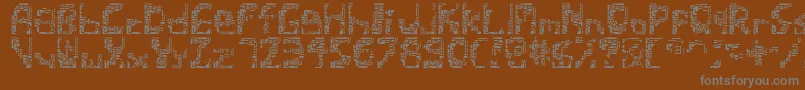 Shatteredsiliconwafers-fontti – harmaat kirjasimet ruskealla taustalla
