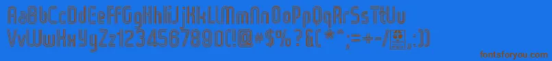 WoxStripedTripleDemo-fontti – ruskeat fontit sinisellä taustalla