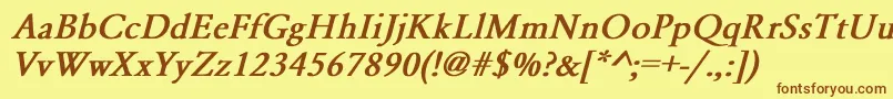 フォントYearlindNormalBoldItalic – 茶色の文字が黄色の背景にあります。