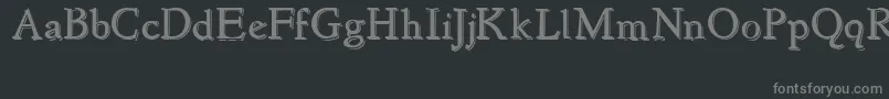 Więcej informacji o czcionce NewstyleEmbossed Czcionka NewstyleEmbossed – szare czcionki na czarnym tle