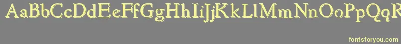NewstyleEmbossed Font – Yellow Fonts on Gray Background