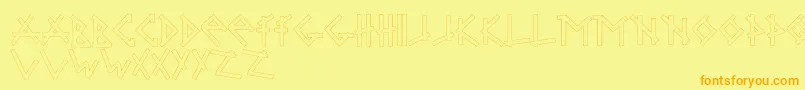 フォントBrabbelBlocks – オレンジの文字が黄色の背景にあります。