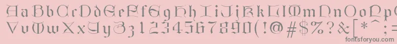 フォントGothici – ピンクの背景に灰色の文字